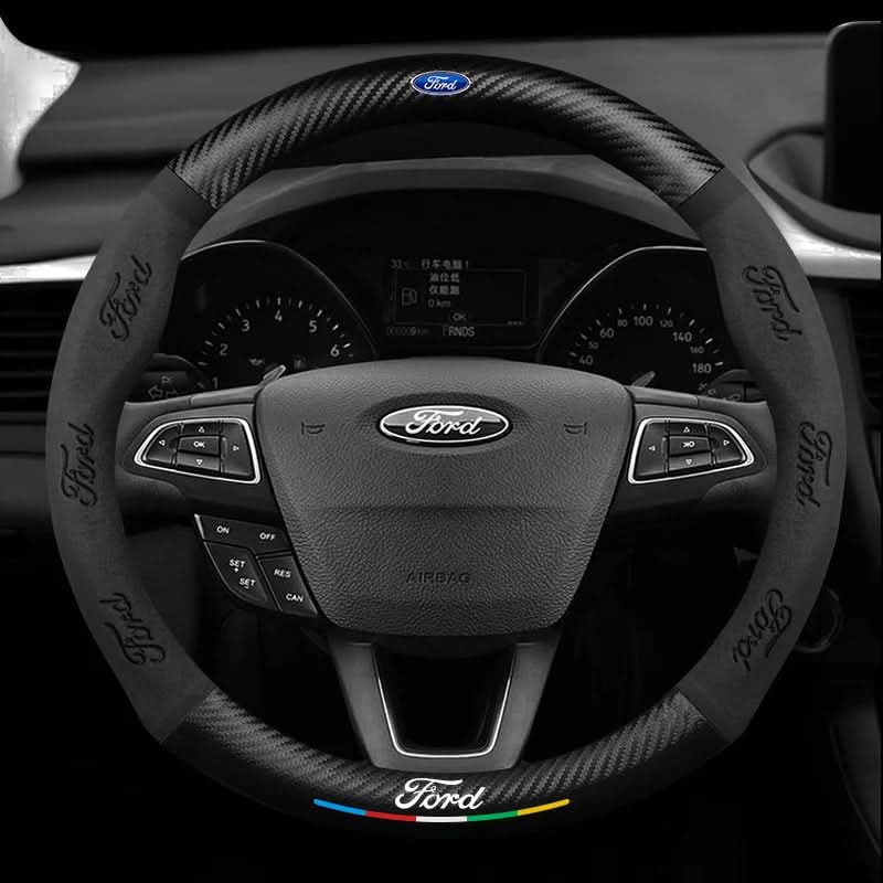 Steering wheel cover with carbon effect textured panels and accent stripe