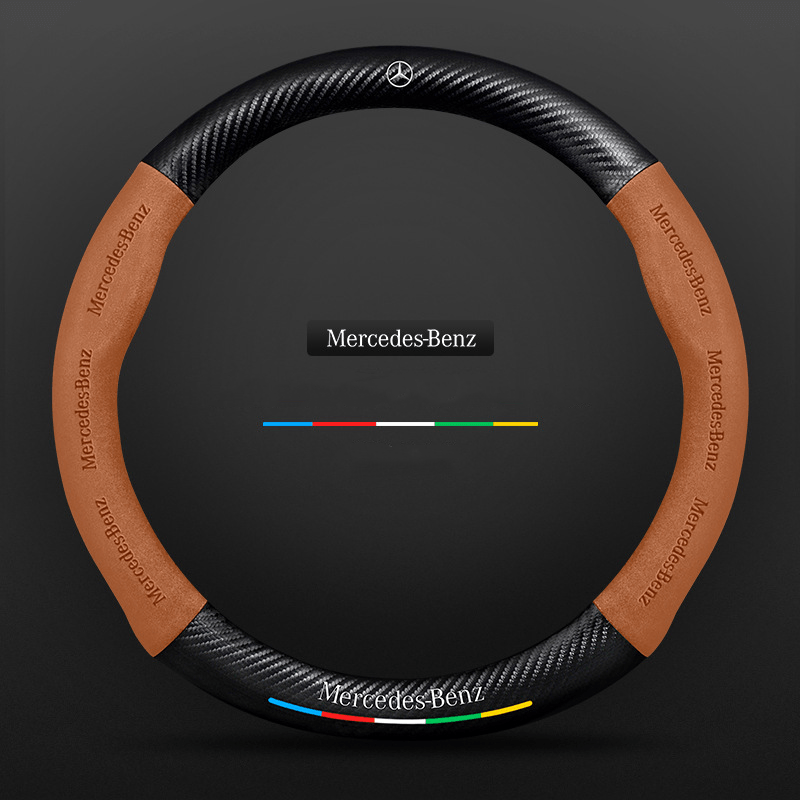 Steering wheel cover with carbon effect textured panels and accent stripe