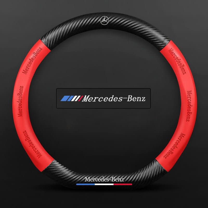 Steering wheel cover with carbon effect textured panels and accent stripe