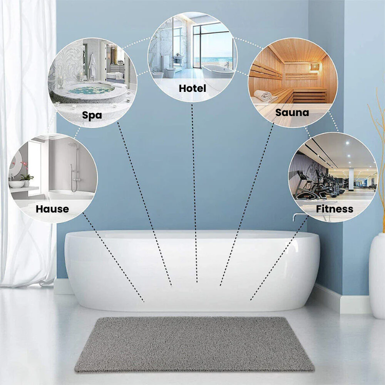 Textured rectangular non-slip shower mat beside a bathtub