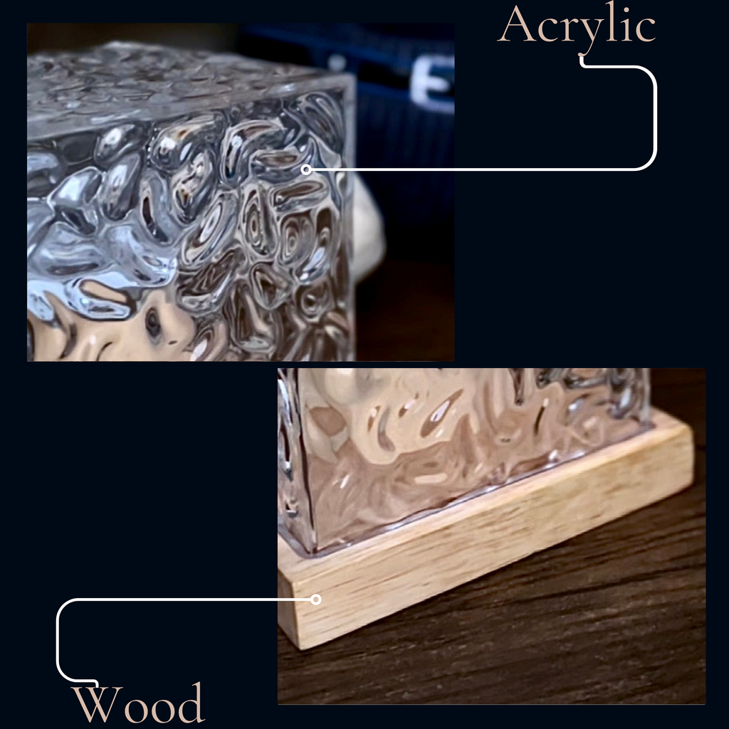 Textured clear cube table lamp glowing with colourful aurora effect light