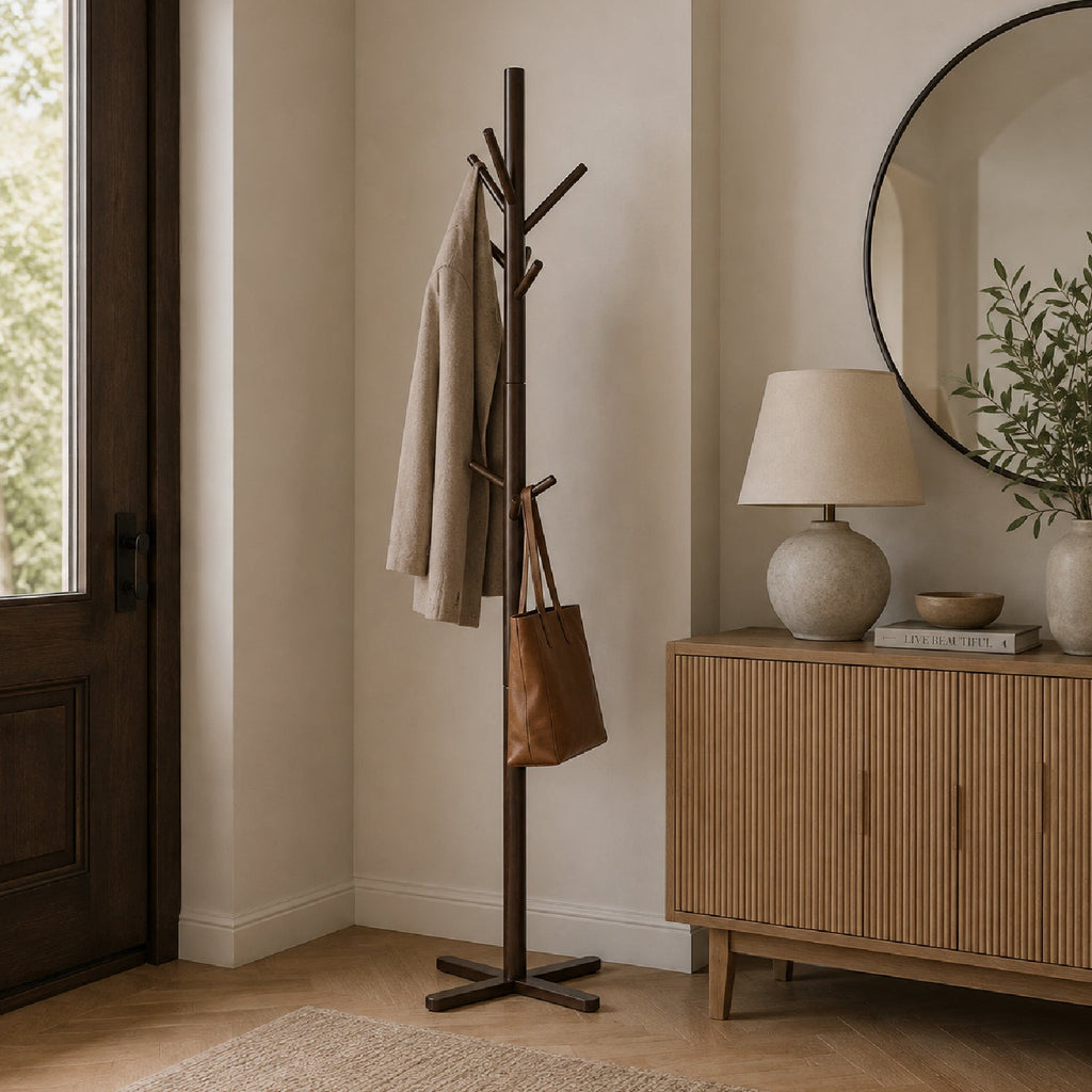 Tall brown solid wood coat rack with branch-style hooks and cross-shaped base