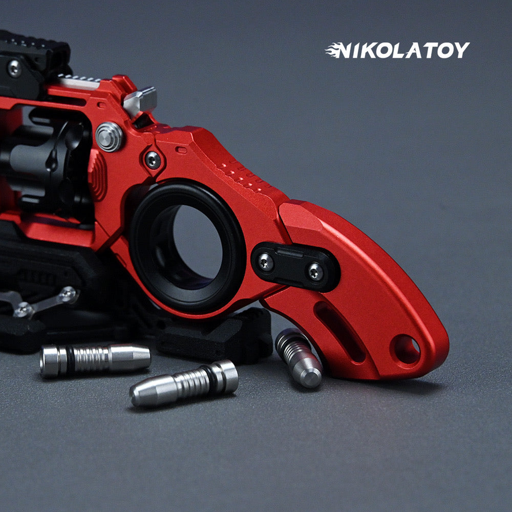 Red and black revolver-style fidget toy with silver pieces