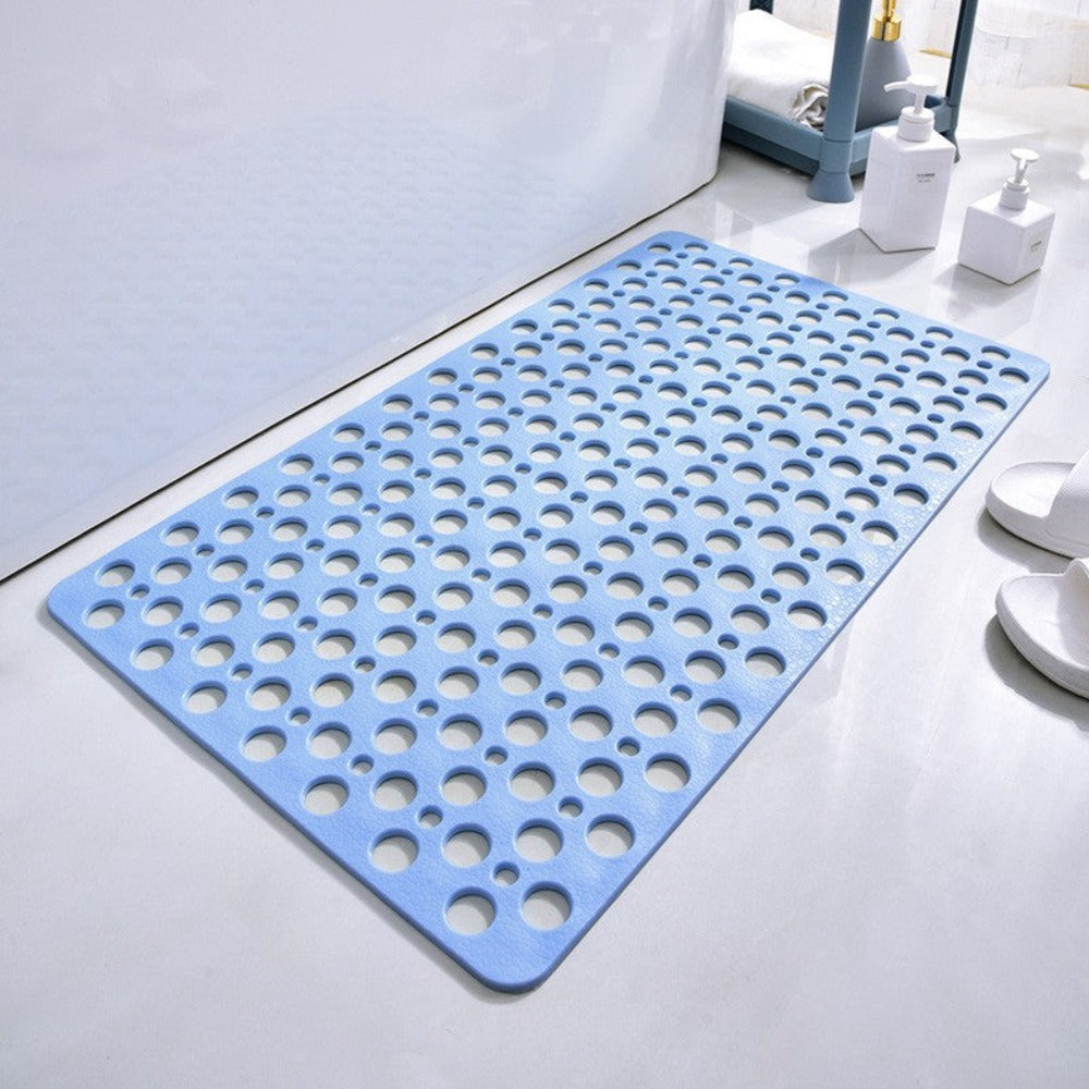 Perforated non-slip bath mat with repeated circular holes