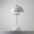 Portable dome table lamp with layered rounded shade and base