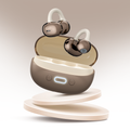 True wireless earbuds with curved ear hooks in an open charging case