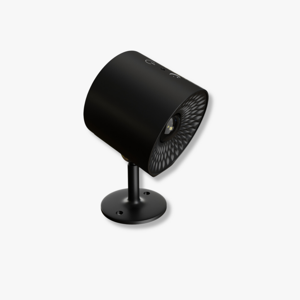 Table lamp with a cylindrical shade, textured reflector, upright stand and round base