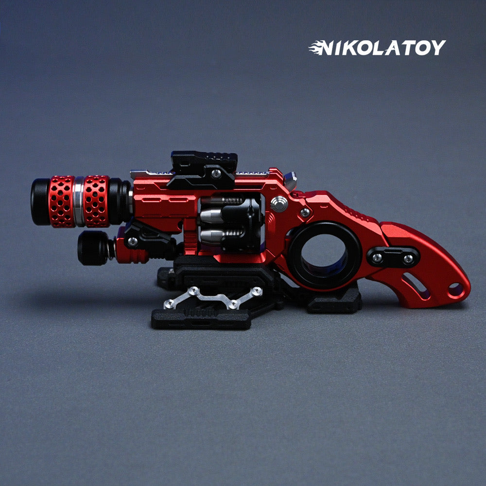 Red and black revolver-style fidget toy with silver pieces