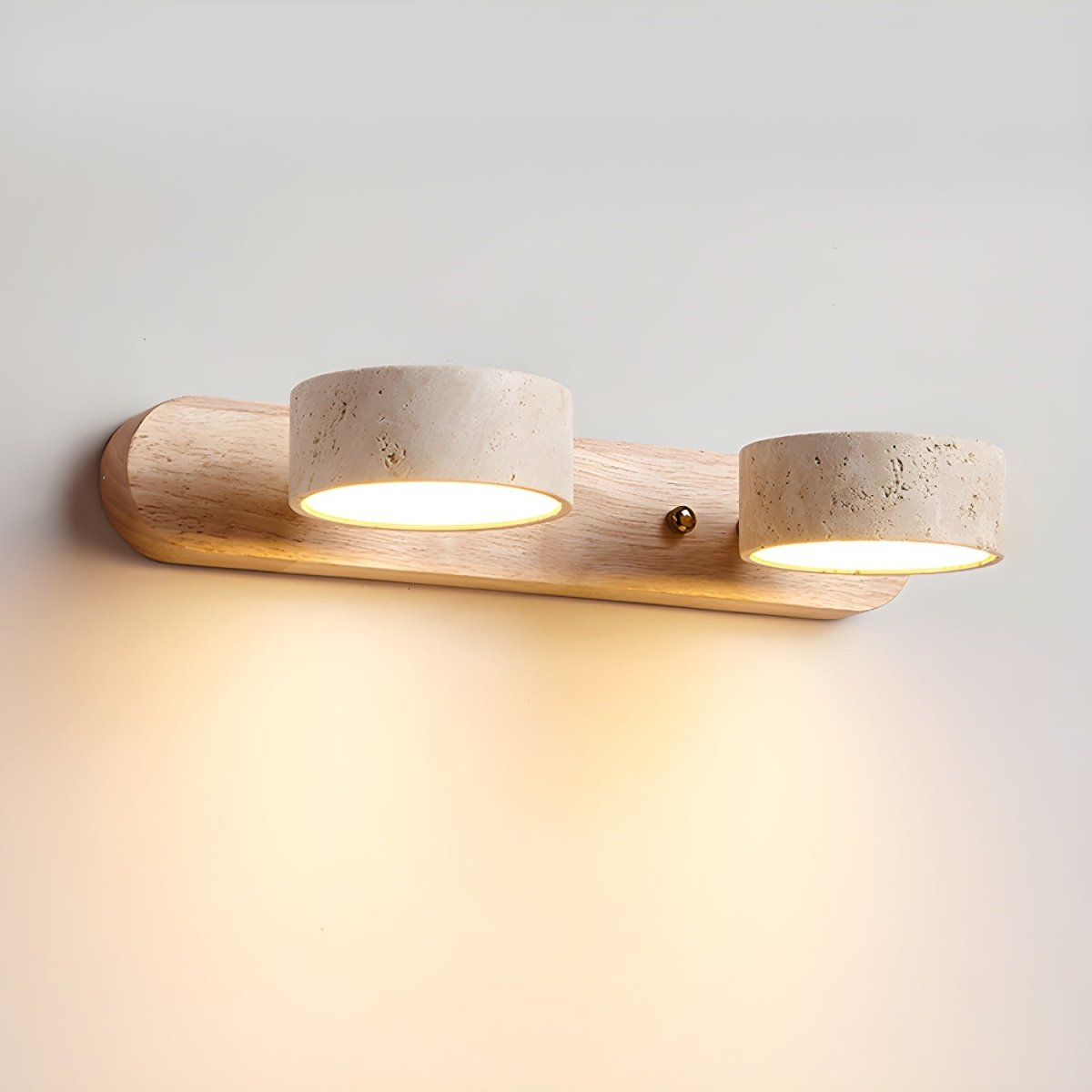 LED wall light with two travertine-effect shades on a wood-effect bar