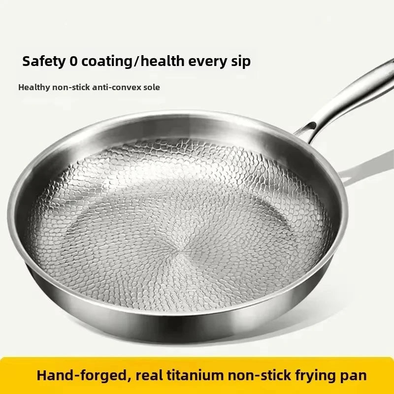 Silver titanium non-stick frying pan with hammered interior and long handle