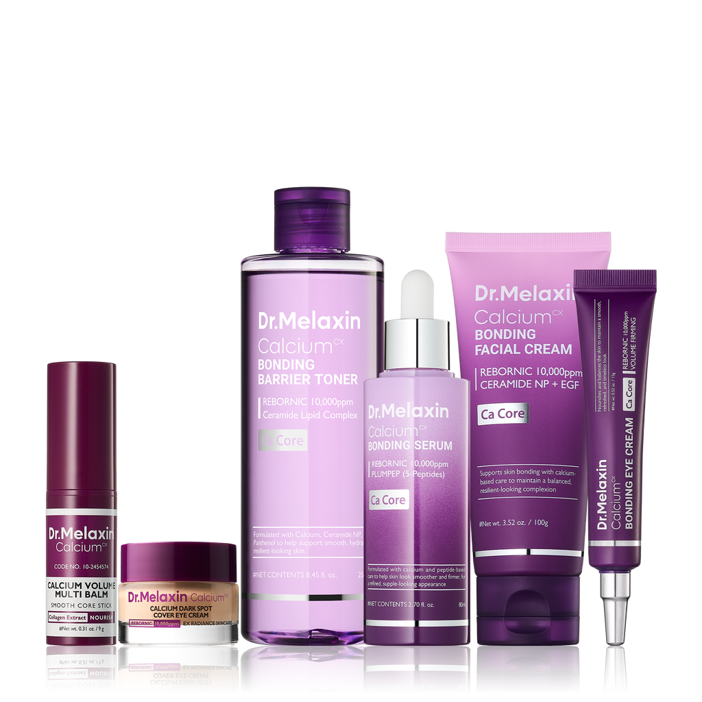 Calcium skincare set with purple toner, serum, creams and balm stick