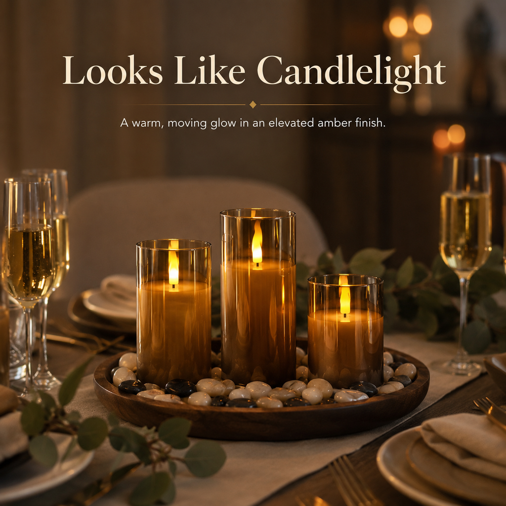 Three flameless cylindrical candle lights with flame-effect glow