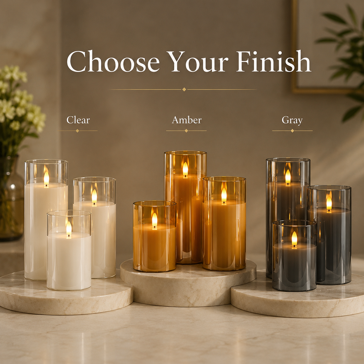 Three flameless cylindrical candle lights with flame-effect glow
