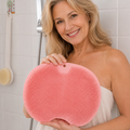 Textured handheld shower scrubber with dense bristles
