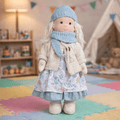 Handmade Waldorf doll wearing knitted clothing and a patterned dress