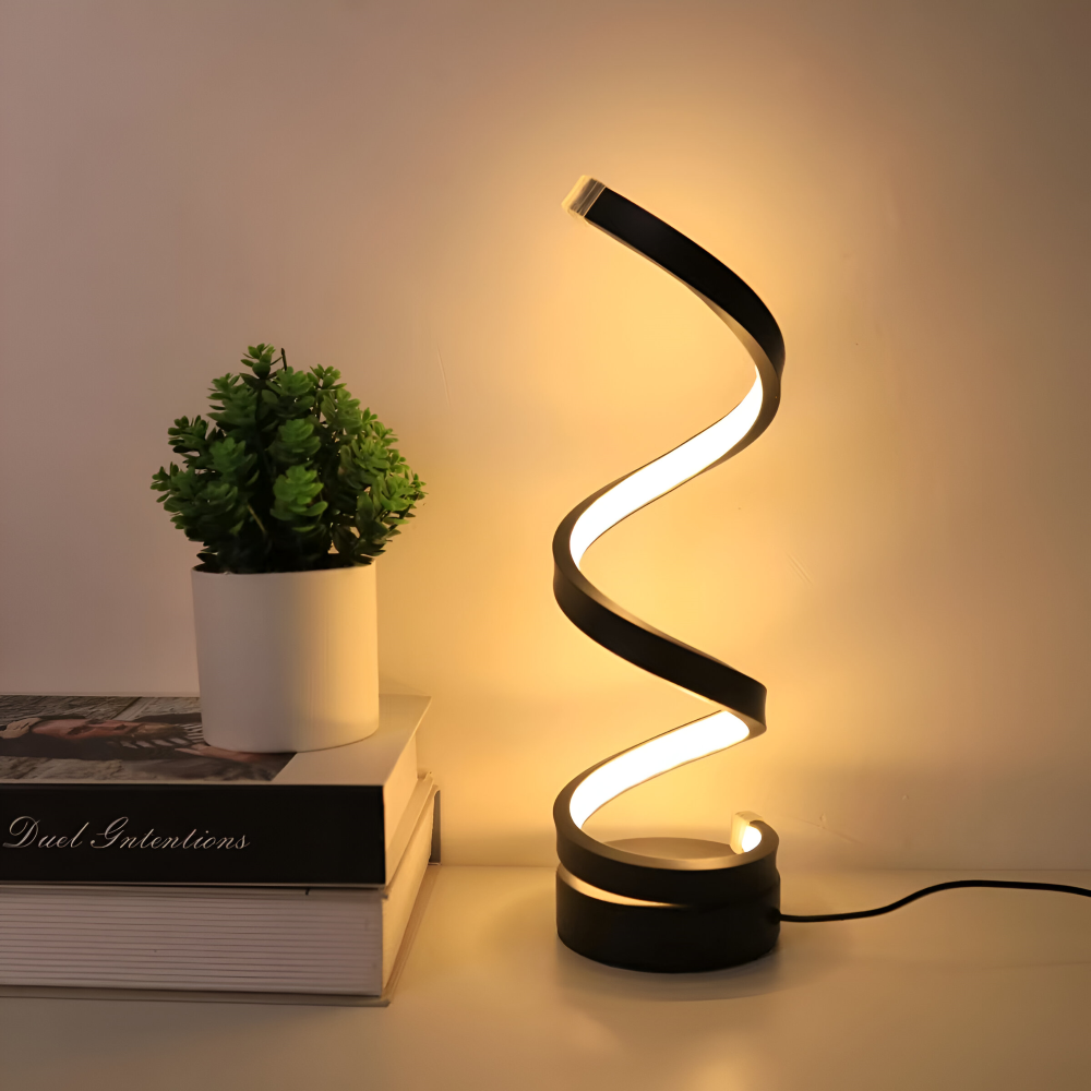 Spiral table lamp with illuminated light strip and round base