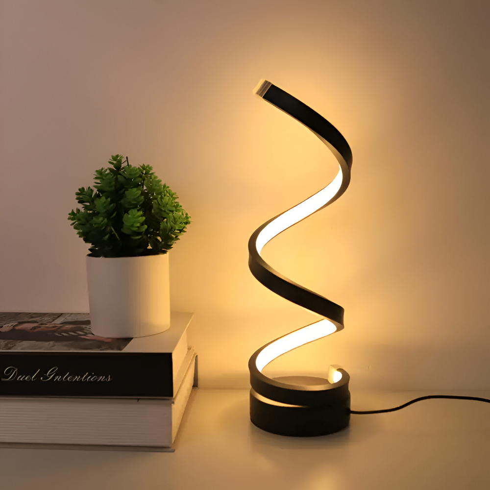 Spiral table lamp with illuminated light strip and round base