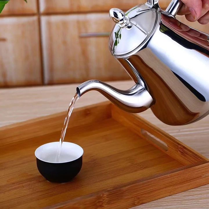 Lidded induction stovetop kettle with whistle and long pouring spout