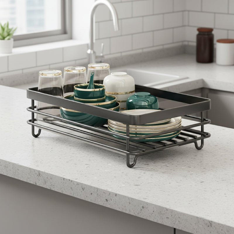 Double-layer foldable dish drying rack beside a kitchen sink