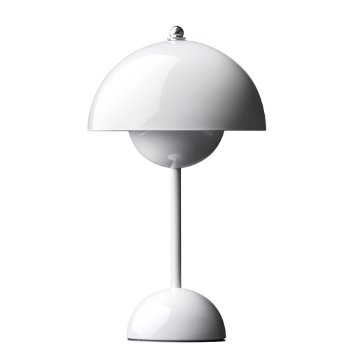 Wireless table lamp with a rounded dome shade and glossy finish