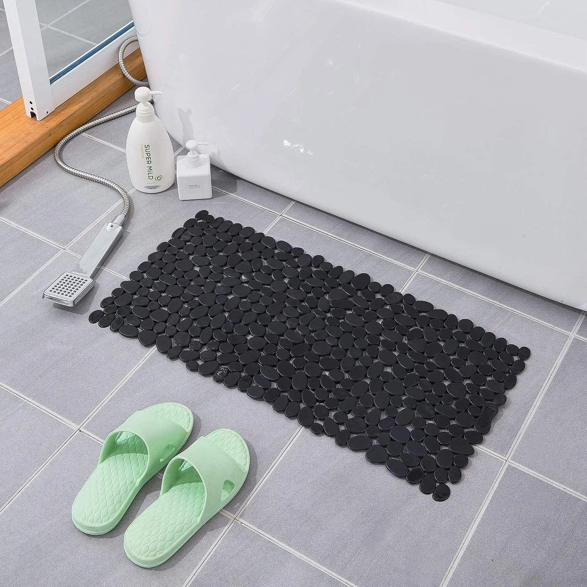 Rectangular non-slip bath mat with rounded pebble design