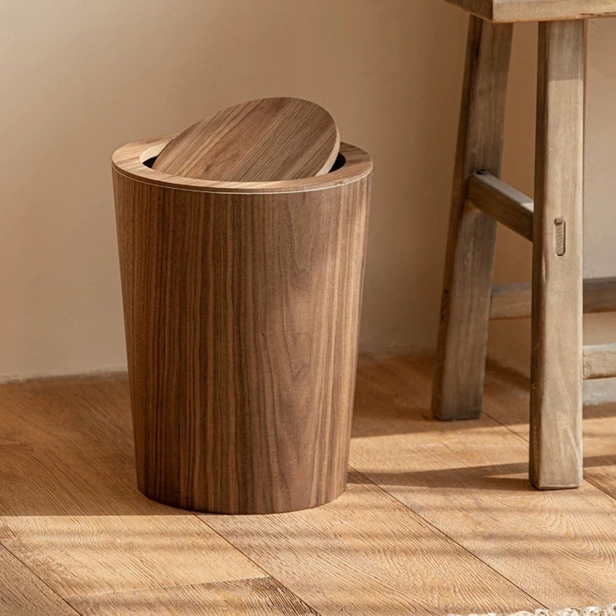 Brown cylindrical wood-effect waste bin with rotating lid