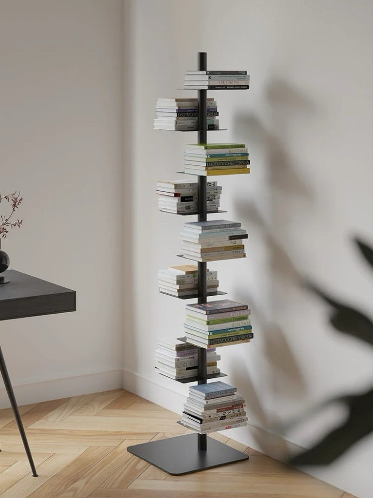 Freestanding steel bookshelf with staggered ledge shelves