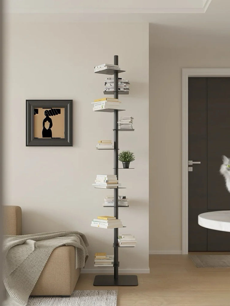 Freestanding steel bookshelf with staggered ledge shelves
