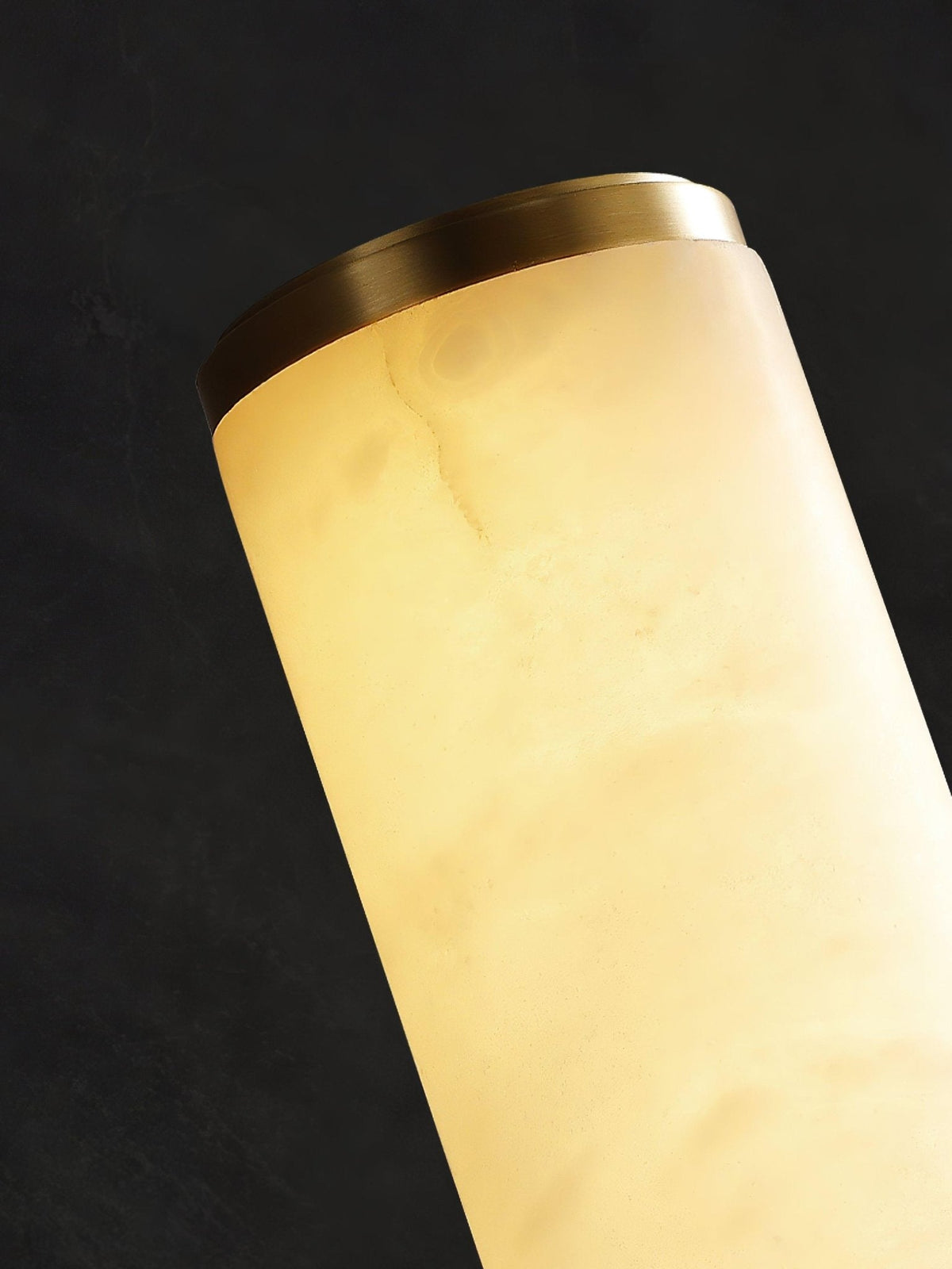 Vertical alabaster column wall sconce with cylindrical illuminated shade
