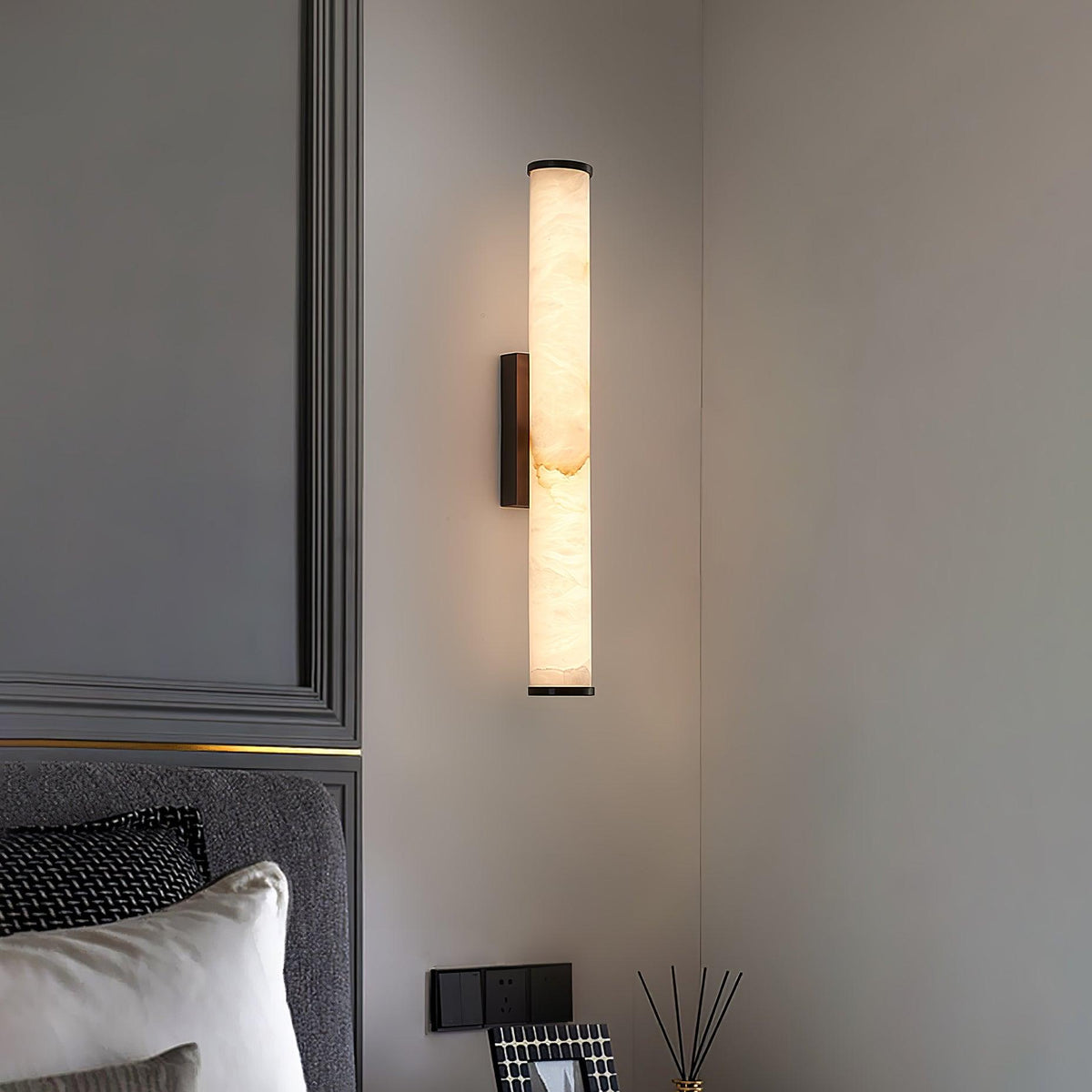 Vertical alabaster column wall sconce with cylindrical illuminated shade