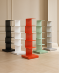 Freestanding tiered metal bookshelf with open shelves and a rectangular base