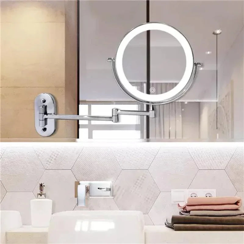 Round wall mounted vanity mirror with illuminated LED ring and articulated arm