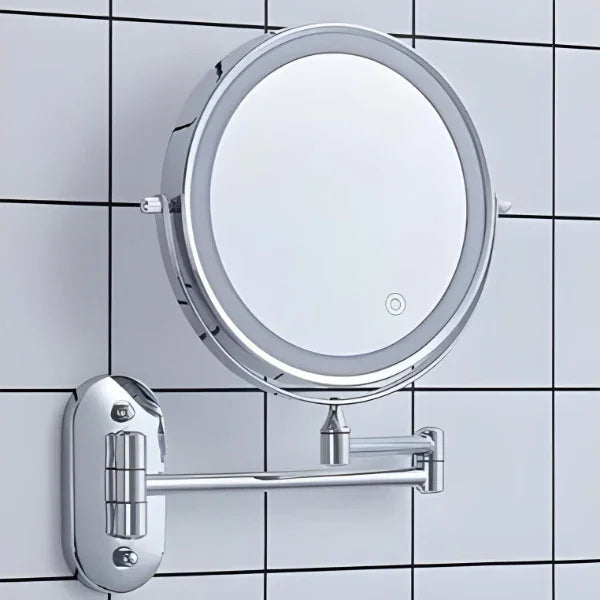 Round wall mounted vanity mirror with illuminated LED ring and articulated arm