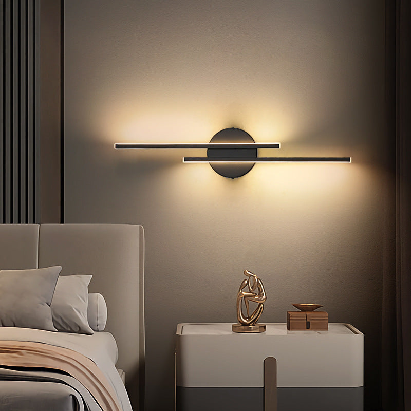 Slim vertical adjustable wall sconce with circular backplate