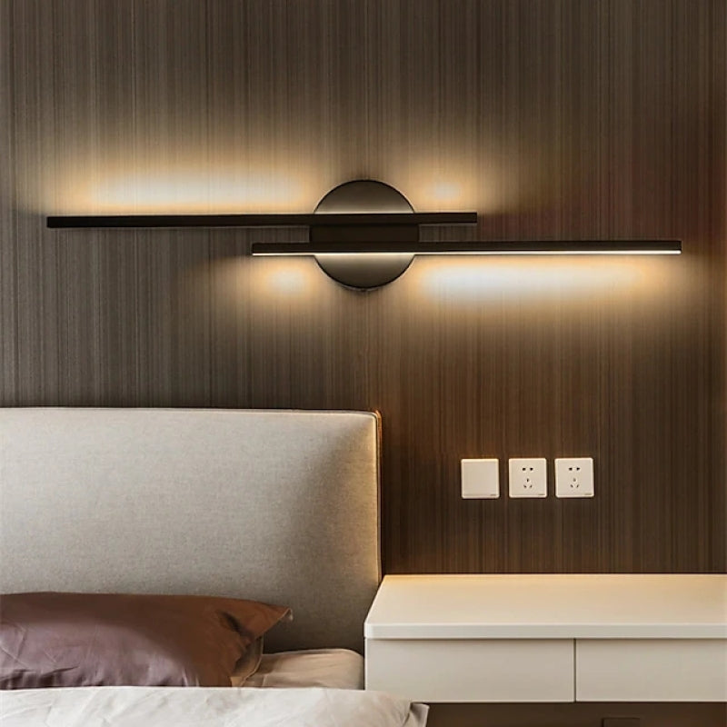 Slim vertical adjustable wall sconce with circular backplate