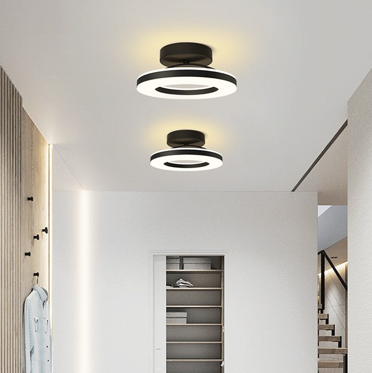 Circular flush mount ceiling light with layered LED rings