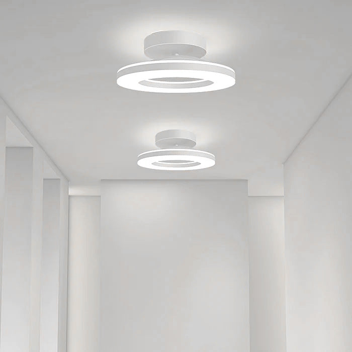 Circular flush mount ceiling light with layered LED rings