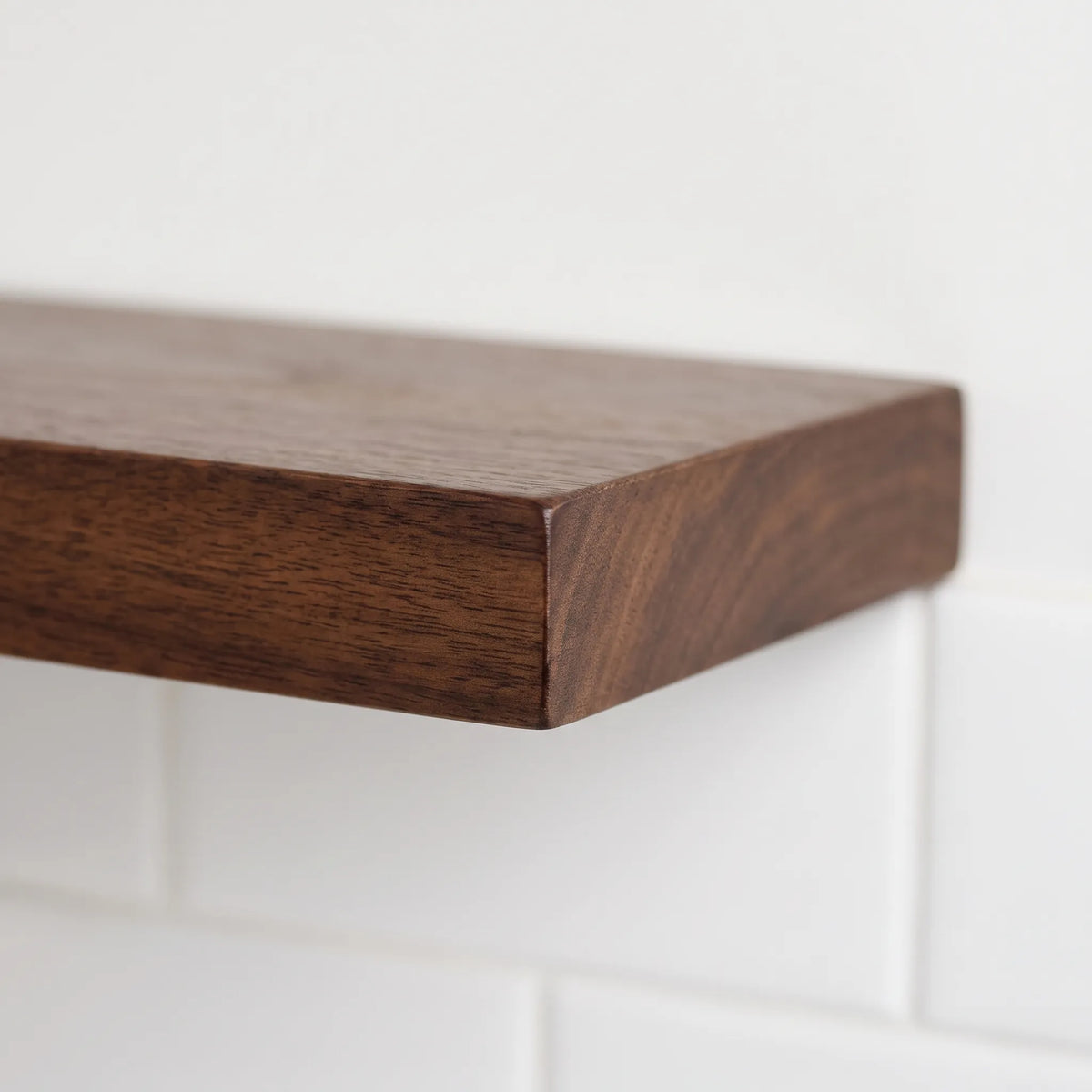 Elevis - Minimalist Floating Wall Shelf Displaying Decorative Items