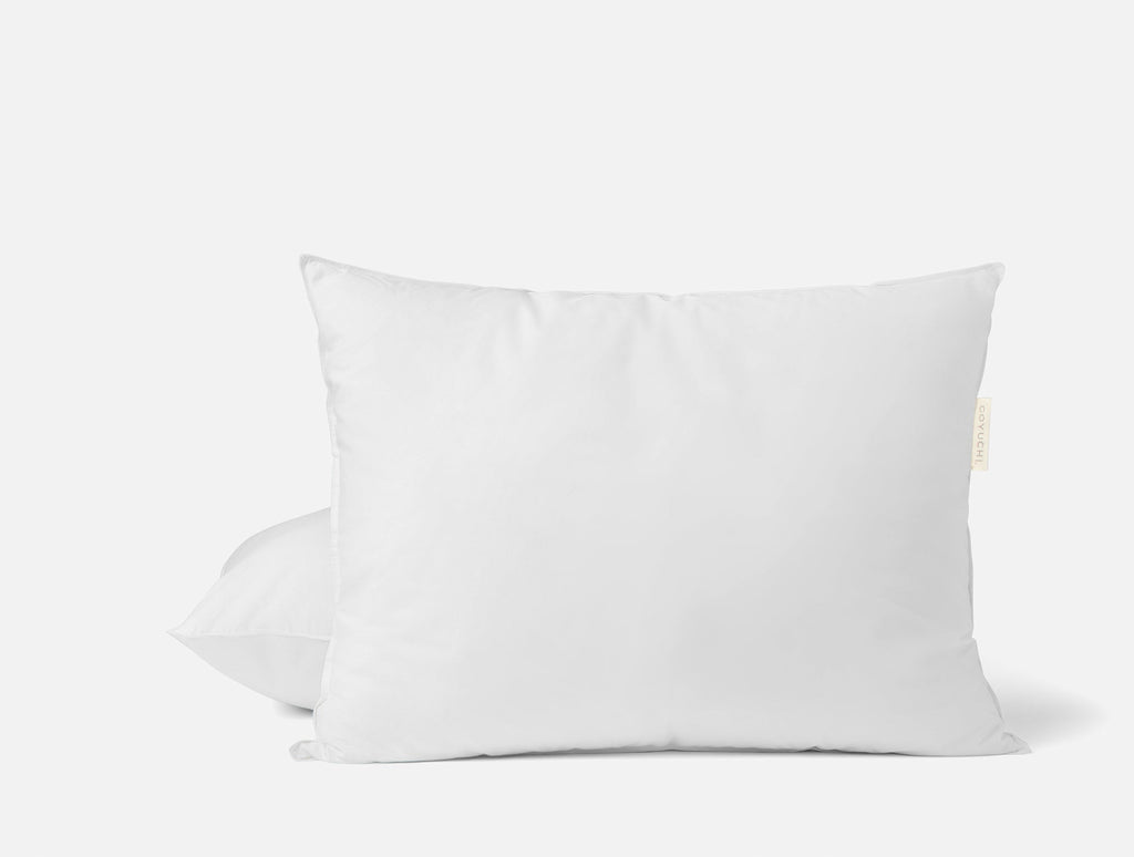 White down feather pillow insert with a soft quilted cover