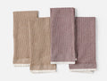 Set of four waffle-textured kitchen towels with contrast trims