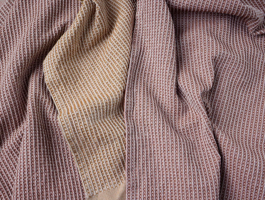 Set of four waffle-textured kitchen towels with contrast trims