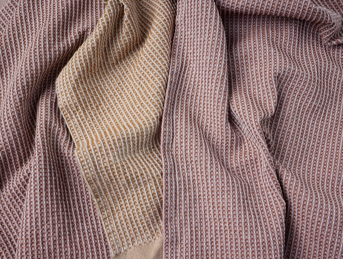 Set of four waffle-textured kitchen towels with contrast trims