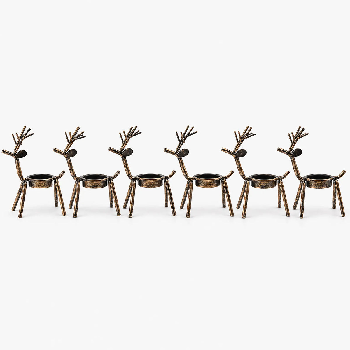 Fernlock - Reindeer Tea Light Candle Holder Setting A Warm Glow On A Mantel Or Tabletop