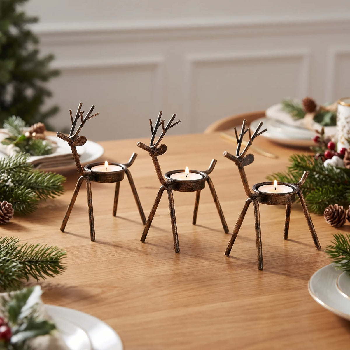 Fernlock - Reindeer Tea Light Candle Holder Setting A Warm Glow On A Mantel Or Tabletop