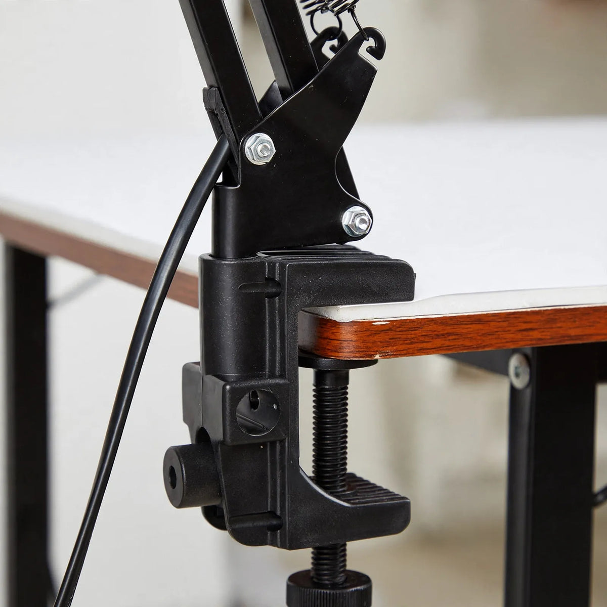 Fintok - Adjustable Clamp Desk Lamp With Articulated Arm Illuminating A Dedicated Workspace Without Cluttering Table Space