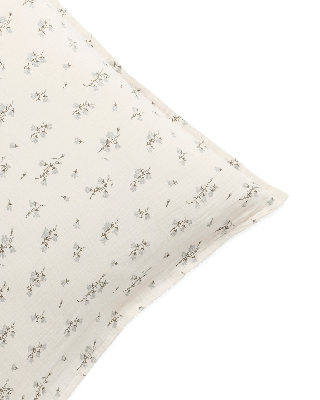 Cream muslin pillowcase with a delicate botanical floral pattern