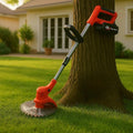 Orange cordless brush cutter with adjustable shaft and circular cutting blade