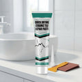 White ceramic tile repair paste tube with yellow spatula, nozzle and sanding sheets