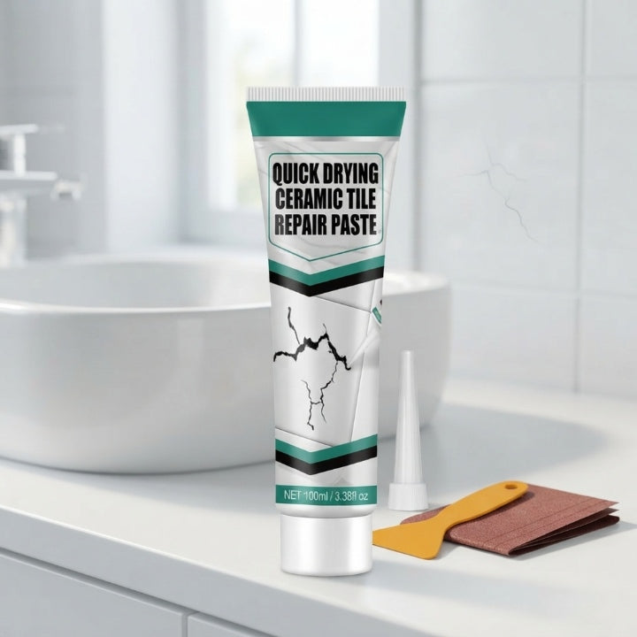 White ceramic tile repair paste tube with yellow spatula, nozzle and sanding sheets