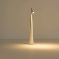 Cordless conical LED table lamp with angled light head